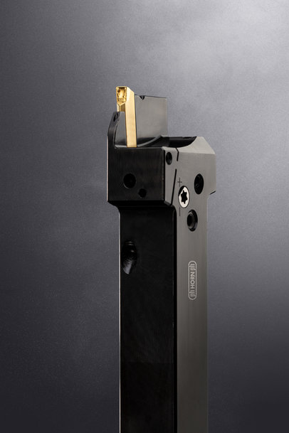 Horn optimised for Swiss-type lathes